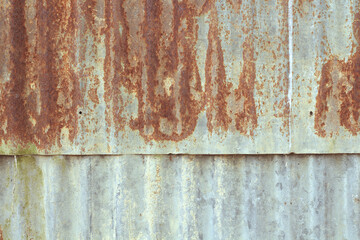 Old zinc vintage fence wall texture for background, pattern of rusty on metal panel.