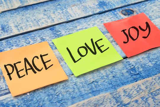 Peace Love Joy, text words typography written on paper, life and business motivational inspirational