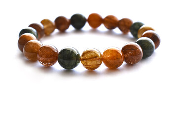 5 colours rutilated quartz bracelet isolated on white background. 