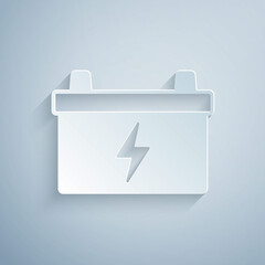 Paper cut Car battery icon isolated on grey background. Accumulator battery energy power and electricity accumulator battery. Paper art style. Vector