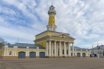 Fototapeta premium The old building of the fire station on a cloudy May morning. Kostroma, Golden Ring of Russia
