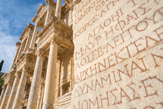 Ancient greek inscriptions on the wall of Celsus Library in the Ephesus ancient city, Turkey