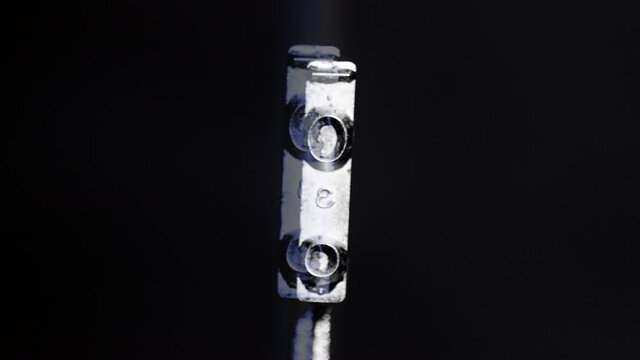 UFO text with old typewriter hammers macro stop motion 