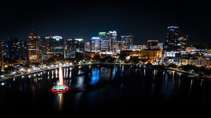 Fototapeta na wymiar Night shot over Lake Eola Park in downtown Orlando, FL.