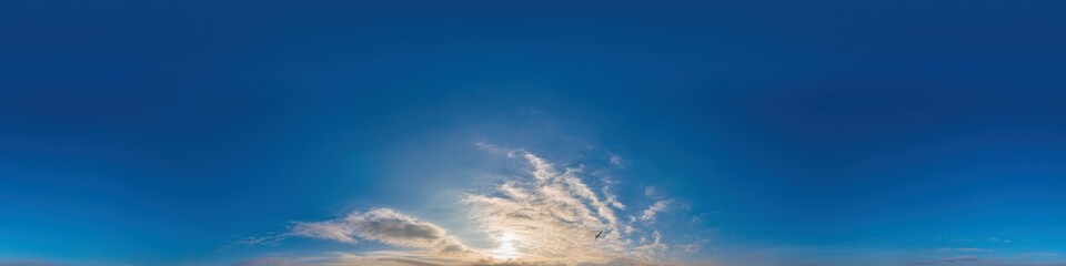 Naklejka premium Blue sky panorama with Cirrus clouds in Seamless spherical equirectangular format. Full zenith for use in 3D graphics, game and editing aerial drone 360 degree panoramas for sky replacement.