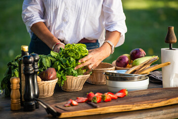 woman preparing vegetables