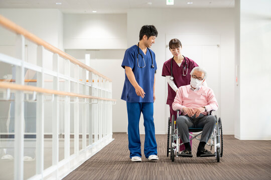 Healthcare Worker and Patient - Powered by Adobe