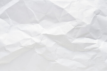White crumpled paper texture background.