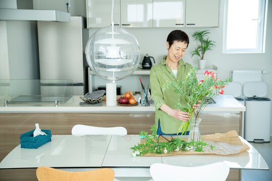 Woman Arranging Flowers