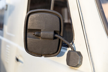 black car mirror on car door. retro design