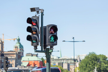 Traffic lights for cars and pedestrians on one of the central streets of Stockholm. Street traffic...