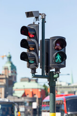 Traffic lights for cars and pedestrians on one of the central streets of Stockholm. Street traffic...