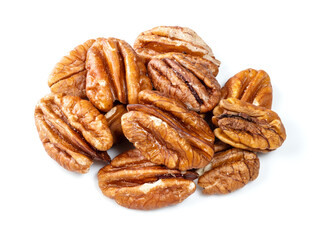 heap of shelled pecan nuts closeup on white