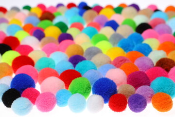 Closeup colorful Pompom in white background
