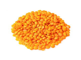 handful of whole red lentils closeup on white
