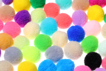 Closeup colorful Pompom in white background