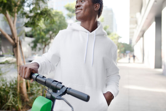 White hoodie on a man with scooter