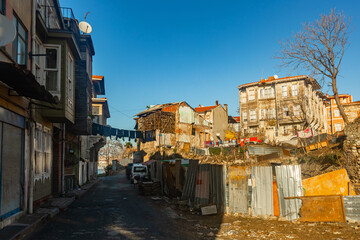 Fototapeta na wymiar View of ramshackle houses in residential quarter Eminonu, Fatih district in Istanbul, Turkey. Shooting date 2021.