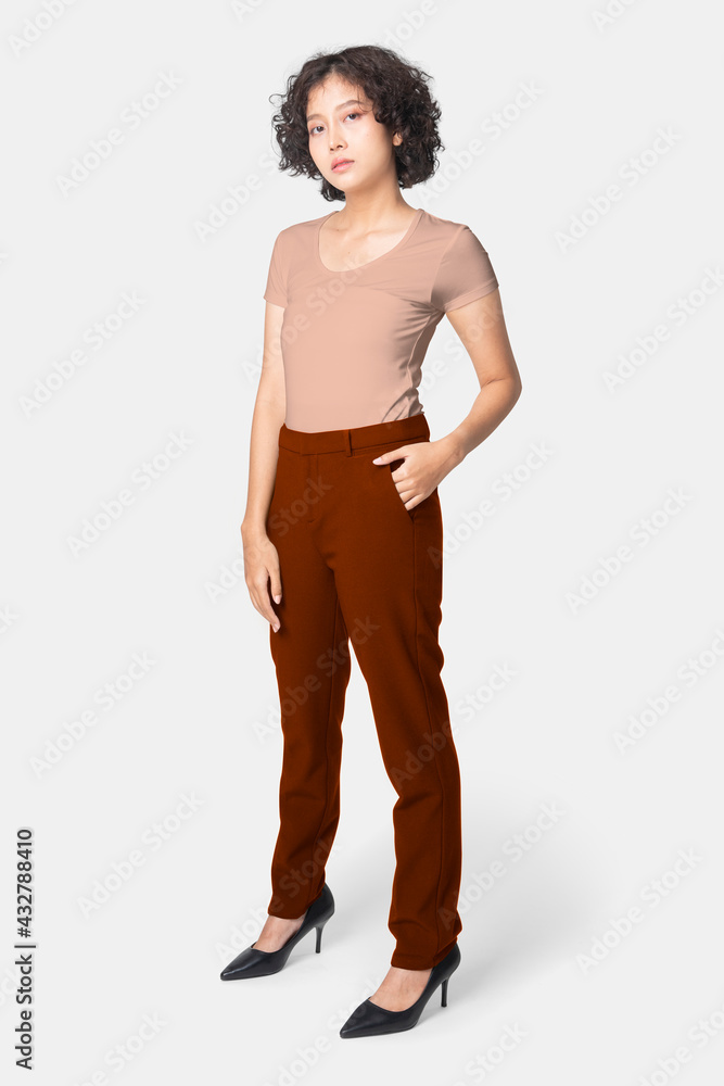 Poster woman in red slack pants and pink tee full body