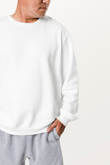 Asian man wearing white sweater close-up