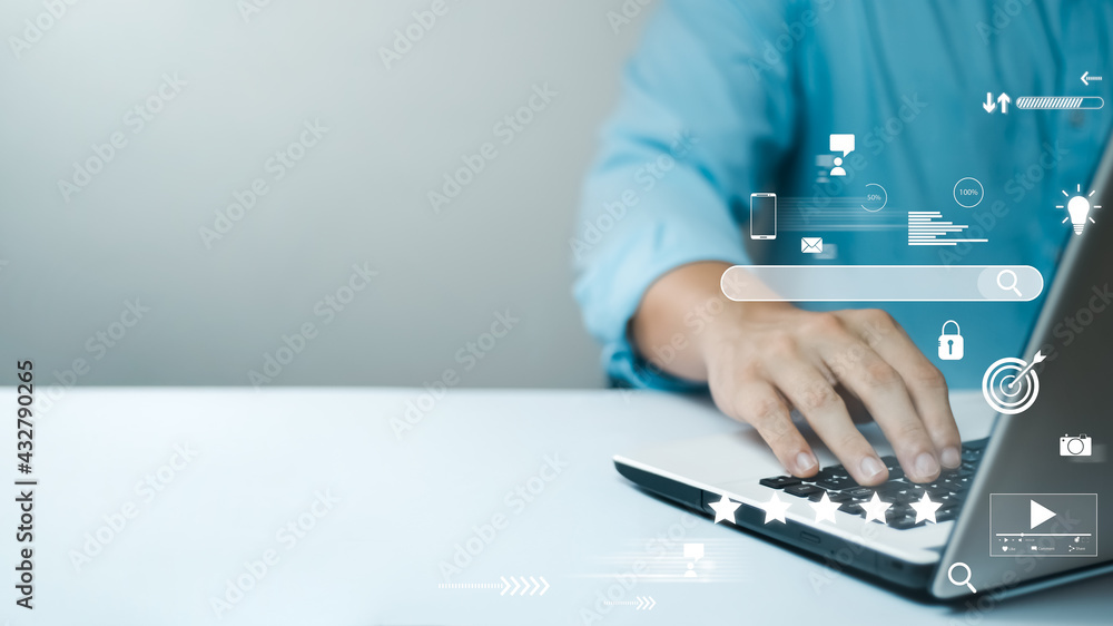 Poster businessman are working on the laptop keyboard to use the search engine optimization tool. to find c