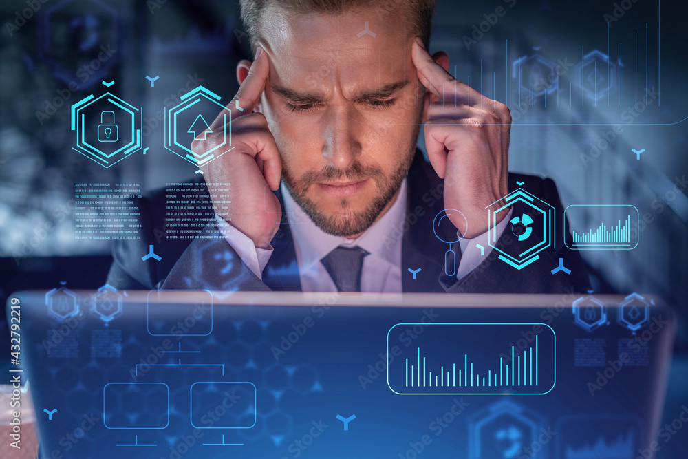 Poster handsome businessman in suit at workplace working with laptop to optimize development by implying ne