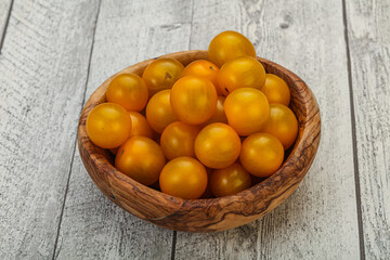 Fresh yellow cherry tomato heap