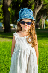 Adorable little girl in the park.