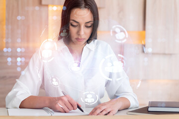 Portrait of businesswoman in formal wear working with documents and looking for employees to hire new candidates for international business consulting. HR, social media icons over office background