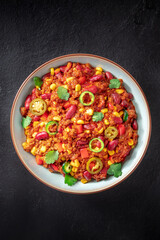 Chilli con carne, shot from above on black