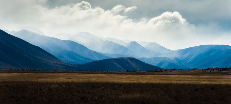 Panorama view of Ben Ohau Range in the mist, Twizel, South Island