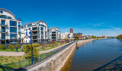 Panoramic view over modern houses at Elbe river in early Spring in Magdeburg, Germany, at blue sky and sunny day