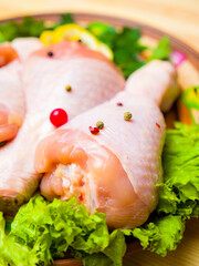 raw chicken legs with spices
