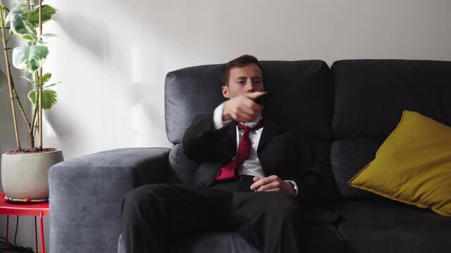 Exhausted hispanic overtime worked exhaustion resting watching tv