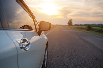 Obraz na płótnie Canvas Eco-Car white color glass reflection on the road