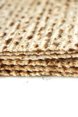 Traditional Jewish kosher matzo for Passover. Set with Passover matzos on white background. Pesach celebration