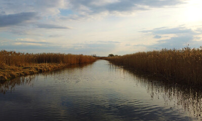 View of the landscape of the river and the reflection of the sky in the water