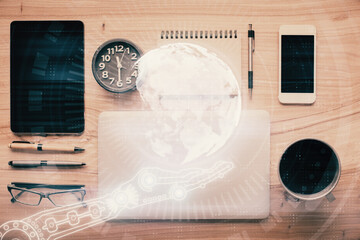 Naklejka premium Double exposure of map hologram drawing over desktop. Top view. International connection concept.