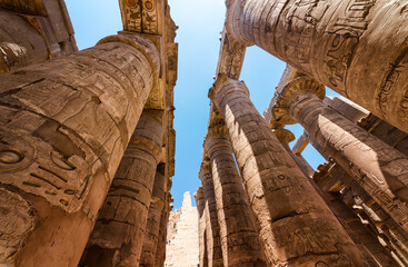 antique statue in the pillared hall in Luxor in Egypt