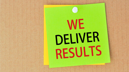 we deliver results written on green paper and pinned on corkboard, concept