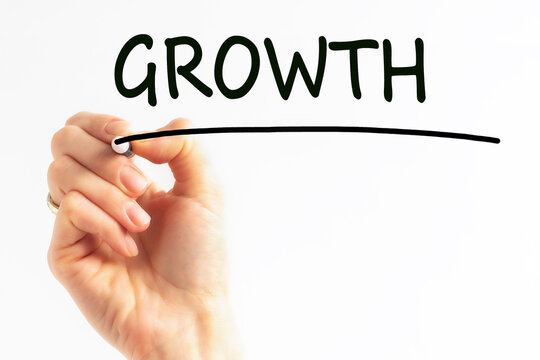 Hand writing inscription growth with marker, concept, stock image