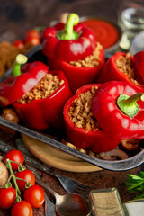 Red peppers stuffed with beef meet and mozarella cheese with herbs and garlic