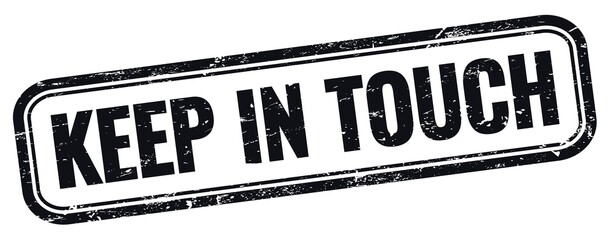 KEEP IN TOUCH text on black grungy vintage stamp.