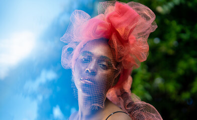 Avant Garde Portrait of Teenage Girl in Recycled Headdress 