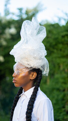 Portrait of Young Girl wearing Recycled Headdress 