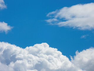 Naklejka na ściany i meble Blue sky with layer of fluffy cumulus clouds
