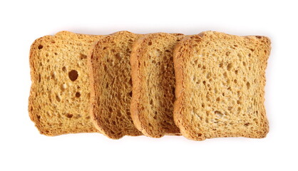 Wholemeal crackers, bread rusks pile, toast slices isolated on white background, top view
