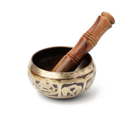 copper singing bowl and wooden mallet isolated on white background. Musical instrument for meditation, relaxation