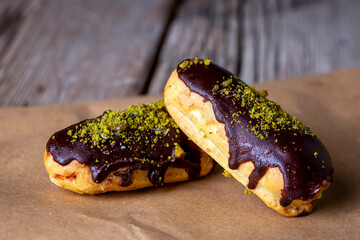Traditional french eclairs with chocolate.