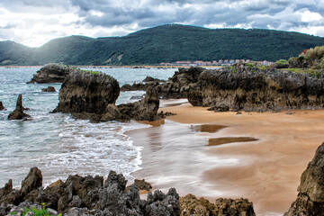 beautiful view of a beach with rocks on the Spanish coast